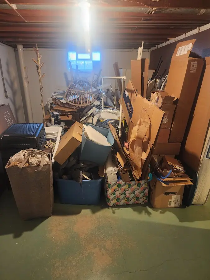 Roll-off dumpster container at job site for 15 Yard Dumpster Rental in Oaklyn